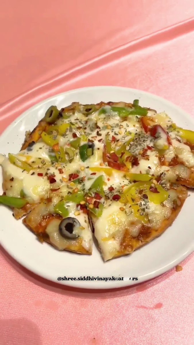 Vegetarian pizza by Shree Siddhivinayak Caterers